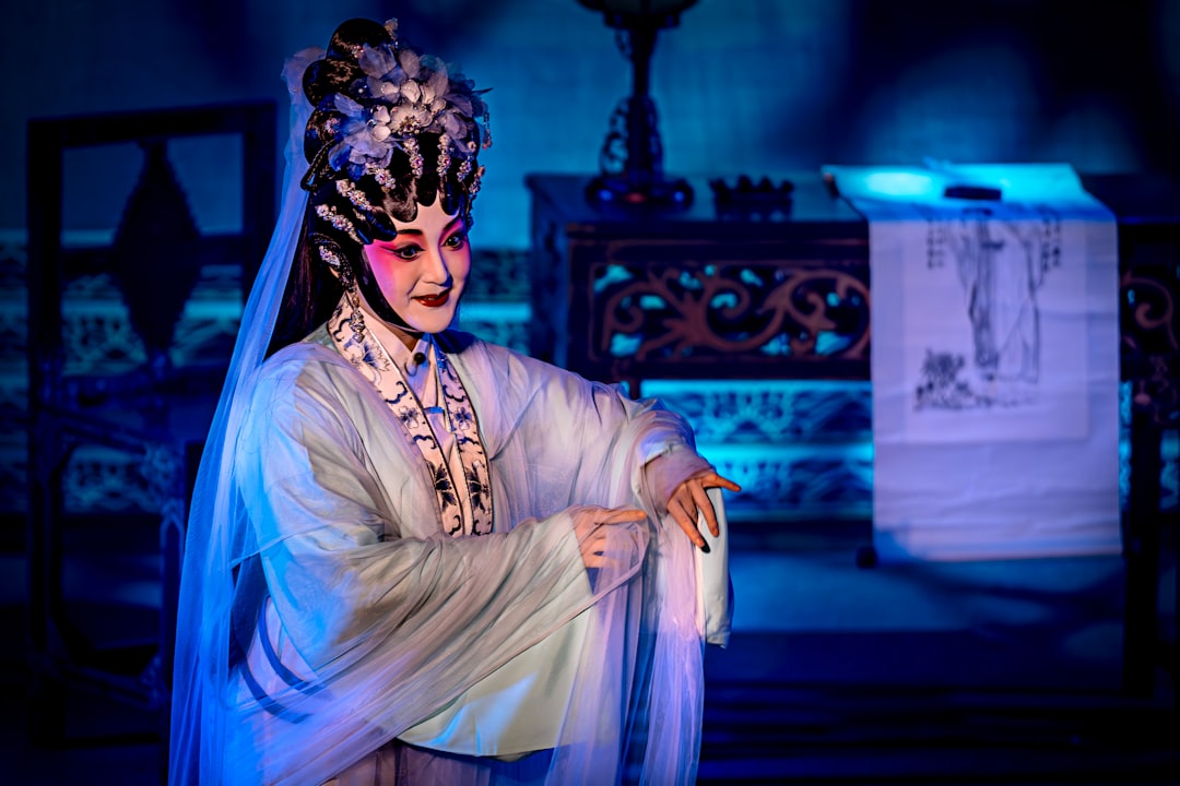 a woman in a costume with a veil on her head