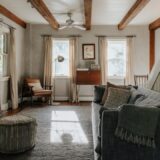 A living room filled with furniture and a fire place