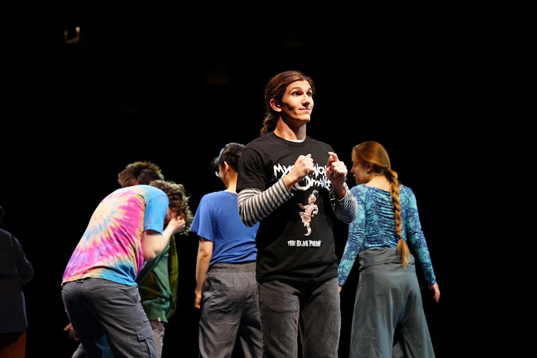 A group of people standing on top of a stage