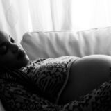 pregnant woman lying on the sofa