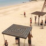 Kandidaten bij een proef op het strand in Expeditie Robinson